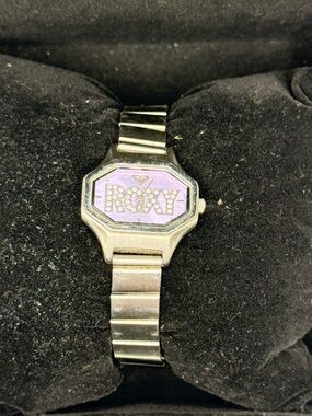 Roxy Womens Silver Tone Octagonal Watch Purple Rhinestone Logo RX445